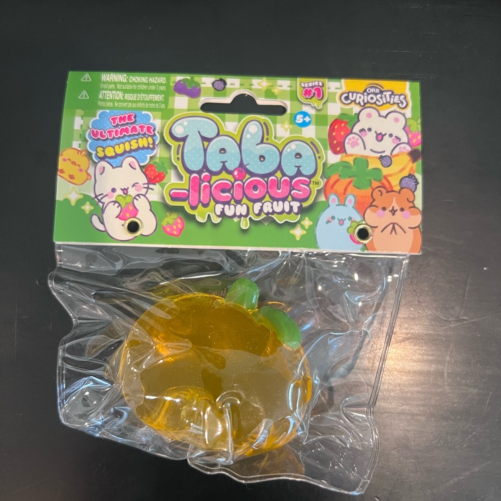 Taba- Licious Fun Fruit Squishy Toy - Orange & Green